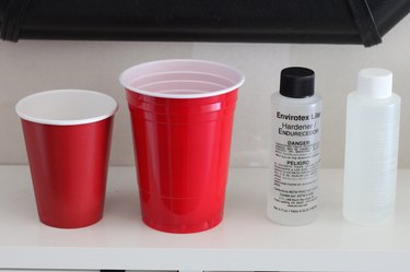 Mixing hardener and resin in plastic cups