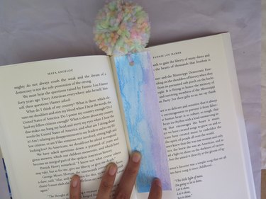 The yarn pompom card stock bookmark.