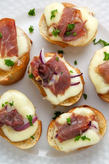An easy crostini recipe made with fig preserves and salty prosciutto.