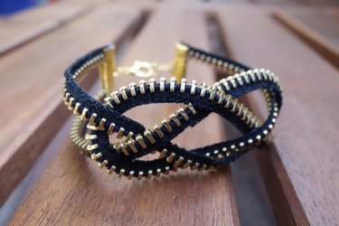 Knotted bracelet made from a zipper.