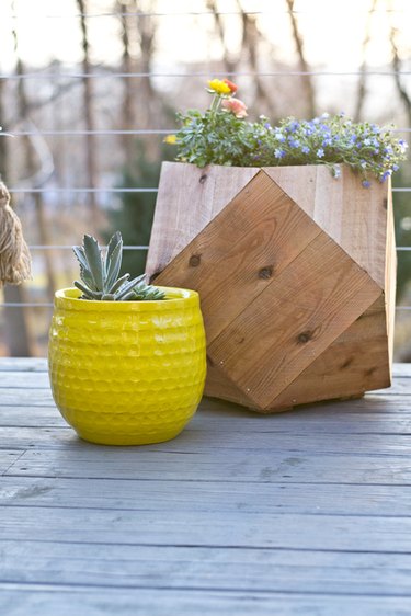 Build a geometric planter from cedar fence pickets.