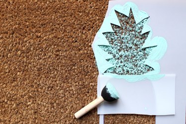 Stamp paint onto pineapple top | how to make a pineapple doormat