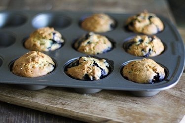 Tray of fresh-baked blueberry muffins.