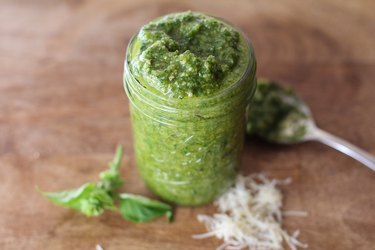 Jar of pesto sauce.