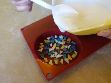 Pouring plaster over glass tile pieces for Arranging glass tile pieces DIY modern terrazzo coasters
