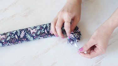 Threading elastic through fabric