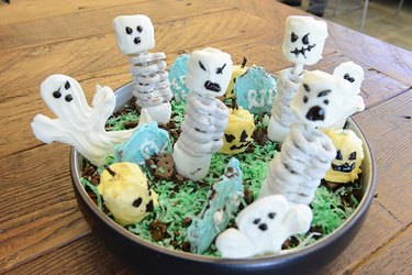 Display of pretzel skeletons and marshmallow pumpkins