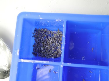 dried lavender at the bottom of the mould.
