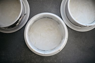 Grease and line three cake tins.
