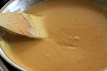 Melted cheese sauce.