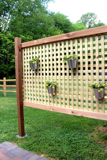 how to build an outdoor privacy screen for your backyard for about $100