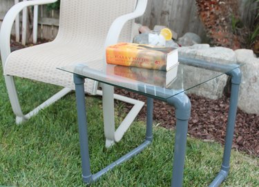 pvc pipe table outside next to lounge chair
