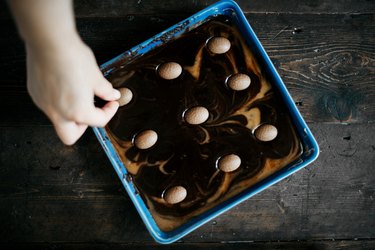 Gently press your choice of easter candy into the top of the brownie.