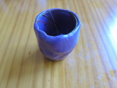 Wrap glass in putty