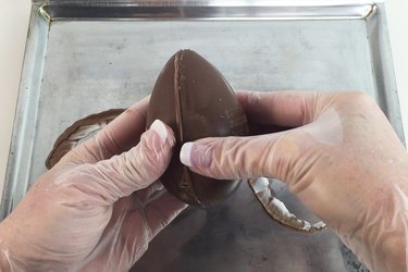 Pressing the chocolate halves together