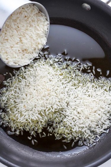 Rice added to saucepan