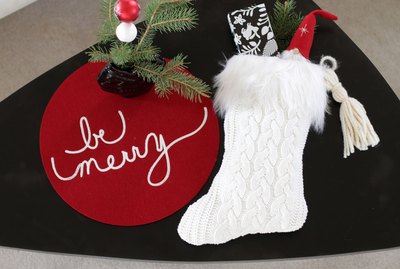 Instead of throwing out those sweaters that may have gotten a bit snug or gone out of style, you can give them a cozy new life as a Christmas decoration.