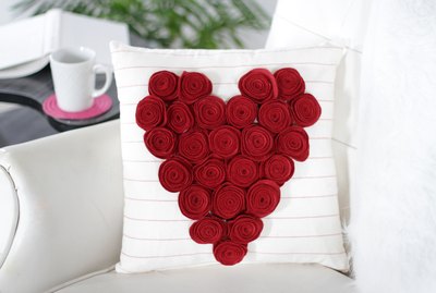 This delightful new rose pillow can be made in an afternoon for your couch, chair or maybe even your love nest.