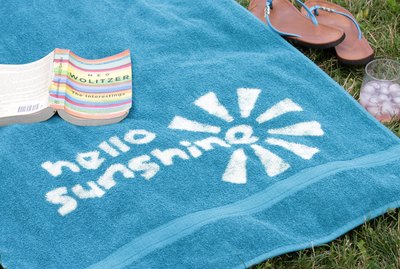 Make a fun fashion statement this summer by creating your own customized beach towel design with bleach.