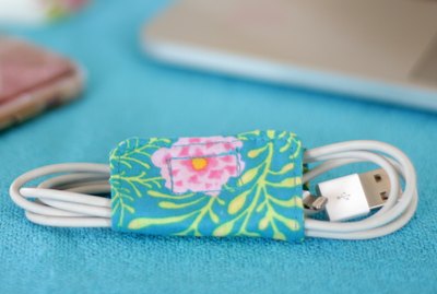 Keep those cords under control and detangled with these cute cord holders that you made yourself from a couple of pieces of scrap fabric.