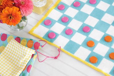 Create this handy checkerboard that's lightweight and convenient enough to throw in a drawer of your camper or even tote along in your backpack.