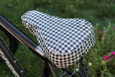 Once you've spent time finding the perfect bike seat for you, protect it from the elements with this oil cloth bike seat cover.