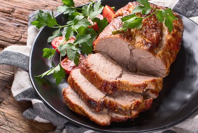 Roast pork with herbs and vegetables