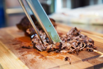 Pulled pork on wooden board