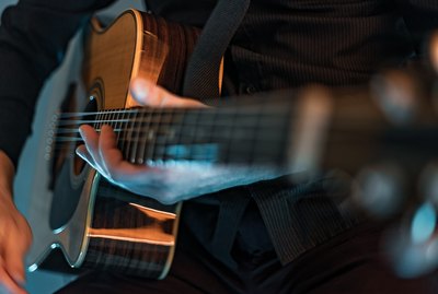 Man playing acoustic guitar