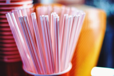 Close-Up Of Drinking Straws In Container