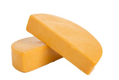 Two Half Wheels of Colby Cheese