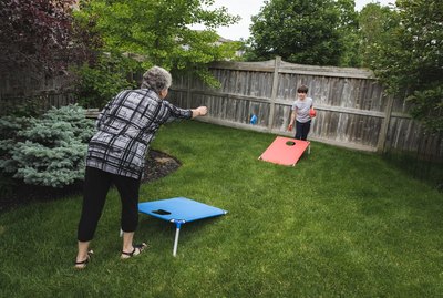 Family playing lawn games