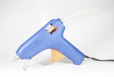 A glue gun is required in order to heat and melt the glue sticks.