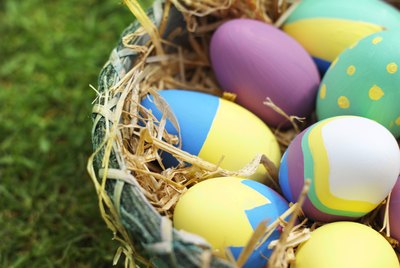 Elevated view of a basket filled with Easter eggs