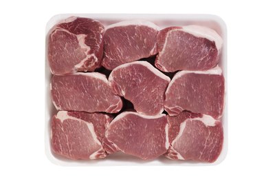 Pork chops on white background