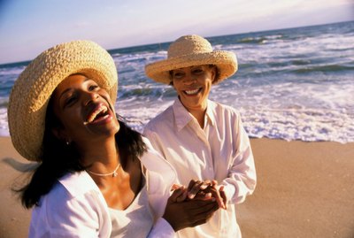 portrait of mother and daughter on the beach