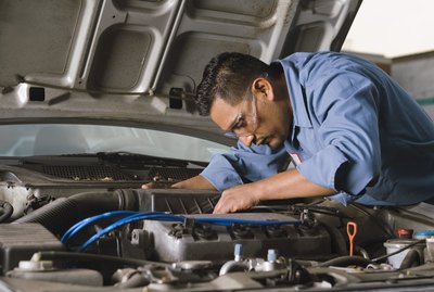 Mechanic fixing engine