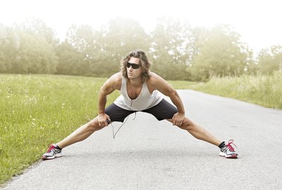 runner stretches his legs