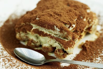 close-up of a portion of tiramisu on a plate