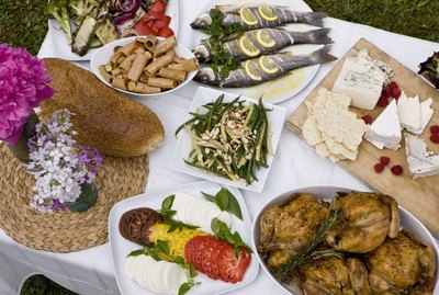 Food at outdoor dinner party in countryside