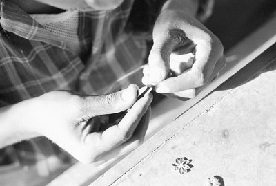 Person making jewelry