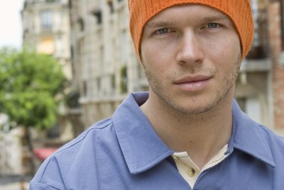 Portrait of hipster in city