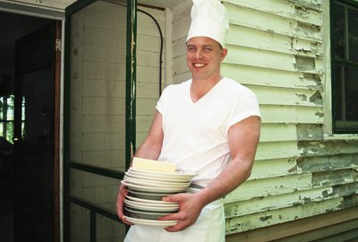 Cook with dishes outdoors