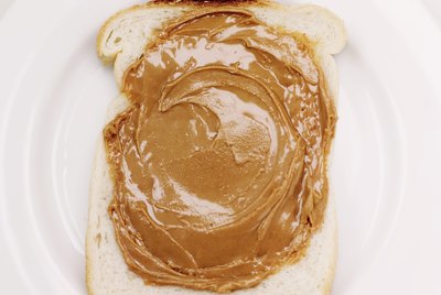 close-up of a slice of bread with peanut butter