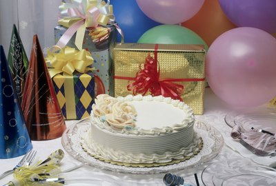Close-up of a birthday cake and presents