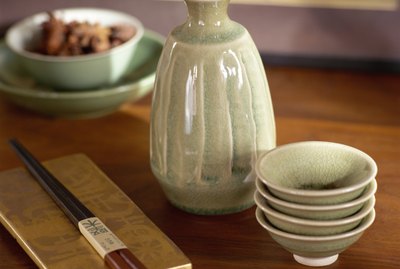 Chopsticks and soy sauce pitcher and bowls