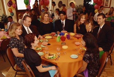 Businesspeople eating in banquet hall party