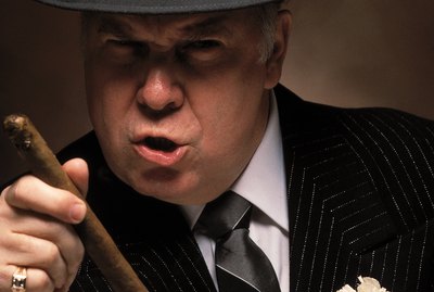 Upset gangster with cigar