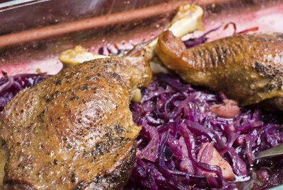 Goose legs baked on red cabbage