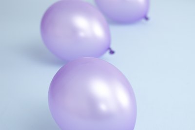 Three purple balloons.